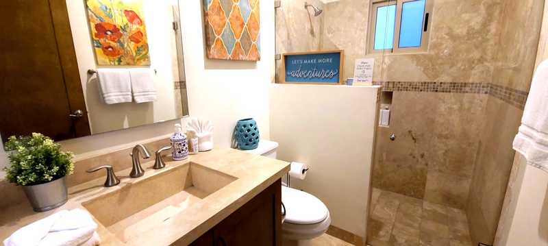 Shared bathroom walk-in shower