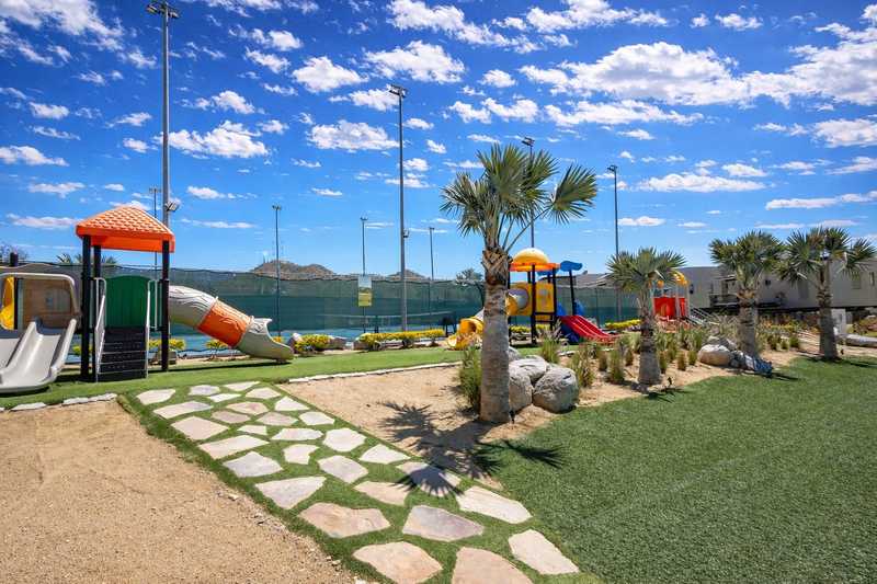 Childrens playground and tennis courts